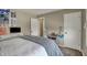 This inviting bedroom offers a bed, desk, and decor, creating a cozy and functional space at 8107 Parcrest Ct, Indianapolis, IN 46259