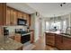 Kitchen boasting granite counters, modern appliances, and seamless flow to the breakfast nook at 8107 Parcrest Ct, Indianapolis, IN 46259