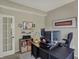 Well-organized office space with a desk, shelving, and tasteful decor for a productive work environment at 8107 Parcrest Ct, Indianapolis, IN 46259