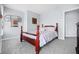 Cozy bedroom with soft carpet, accent wall, and natural light at 8414 Anchorage Ct, Indianapolis, IN 46236