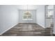 Dining room featuring hardwood floors and chandelier lighting at 8414 Anchorage Ct, Indianapolis, IN 46236