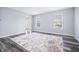 Inviting living room filled with natural light featuring modern flooring at 8414 Anchorage Ct, Indianapolis, IN 46236