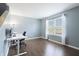 Bright office space with a large window, modern desk, and comfortable chair at 8650 N Springview Dr, McCordsville, IN 46055