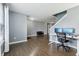 Spacious living room with a modern desk setup and plenty of natural light at 8650 N Springview Dr, McCordsville, IN 46055