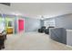 Upstairs loft area with comfortable seating and access to bathrooms and bedrooms at 8650 N Springview Dr, McCordsville, IN 46055