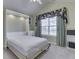 Bedroom featuring a Murphy bed with a bed extended into the room at 871 Gazebo Way, Greenwood, IN 46142