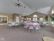 Open clubhouse with seating for large gatherings, featuring neutral paint and lots of light at 871 Gazebo Way, Greenwood, IN 46142