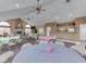 Community clubhouse featuring a kitchenette, fireplace, and ample seating for residents at 871 Gazebo Way, Greenwood, IN 46142