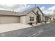 Charming single-story home with stone accents, attached garage, and paved driveway at 871 Gazebo Way, Greenwood, IN 46142