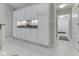 Spacious kitchen with ample cabinet storage and view to the hallway at 871 Gazebo Way, Greenwood, IN 46142