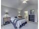 Neutral main bedroom with vaulted ceilings and a view of the en suite bathroom at 871 Gazebo Way, Greenwood, IN 46142