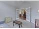 Comfortable sitting room with an entryway to the dining room and hardwood floors at 871 Gazebo Way, Greenwood, IN 46142