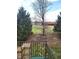 View from balcony showcasing the surrounding lush greenery and trees at 9454 Tanhurst Dr, Indianapolis, IN 46250