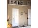 Bedroom featuring a display shelf for dolls and decorative pieces adding a personal touch to the room's aesthetic at 9454 Tanhurst Dr, Indianapolis, IN 46250