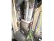 Furnace and water heater in a utility space with concrete floor with plumbing fixtures at 9454 Tanhurst Dr, Indianapolis, IN 46250