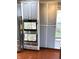 Kitchen details showcasing stainless steel ovens and ample gray cabinetry at 9454 Tanhurst Dr, Indianapolis, IN 46250