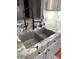 Close up of granite countertops and undermount kitchen sink at 9454 Tanhurst Dr, Indianapolis, IN 46250