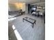 Open concept living area featuring new wood flooring, dining area and neutral paint at 9454 Tanhurst Dr, Indianapolis, IN 46250