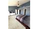 Primary bedroom with vaulted ceilings, ceiling fan and neutral paint at 9454 Tanhurst Dr, Indianapolis, IN 46250