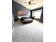 Primary bedroom with vaulted ceilings, ceiling fan and lots of natural light at 9454 Tanhurst Dr, Indianapolis, IN 46250