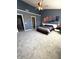 Primary bedroom with vaulted ceilings, ceiling fan and lots of closet space at 9454 Tanhurst Dr, Indianapolis, IN 46250