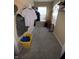 This walk-in closet features carpet flooring, shelving, and window for natural light at 9454 Tanhurst Dr, Indianapolis, IN 46250