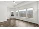 Bright bedroom with large windows offering natural light and hardwood flooring at 11172 Cliffside Dr, Fortville, IN 46040