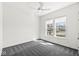 Bedroom with carpet and a window with a view of the neighborhood at 11172 Cliffside Dr, Fortville, IN 46040