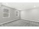 Cozy carpeted bedroom with bright windows offering natural light and views at 11172 Cliffside Dr, Fortville, IN 46040