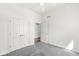 Bedroom with carpet, a closet, and an open doorway to another room at 11172 Cliffside Dr, Fortville, IN 46040
