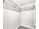 Walk-in closet provides ample storage space with installed shelving and hanger bars at 11172 Cliffside Dr, Fortville, IN 46040