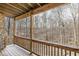 Wooden deck with railing offering a view of the surrounding wooded area at 11172 Cliffside Dr, Fortville, IN 46040