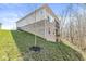 Exterior showing the siding, stone foundation, and screened in porch at 11172 Cliffside Dr, Fortville, IN 46040