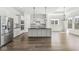 Spacious kitchen with stainless steel appliances, island, and hardwood floors at 11172 Cliffside Dr, Fortville, IN 46040