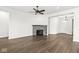 Open living space featuring hardwood floors, a cozy fireplace, and an inviting atmosphere at 11172 Cliffside Dr, Fortville, IN 46040