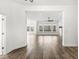 Spacious living room boasting an open floor plan, hardwood flooring, and abundant natural light at 11172 Cliffside Dr, Fortville, IN 46040