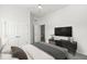 Main bedroom with a ceiling fan, television, and ensuite bathroom at 11172 Cliffside Dr, Fortville, IN 46040