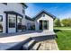 Backyard with a deck, grill, and a gray finished pool house at 1228 Knapps Ct, Greenwood, IN 46142