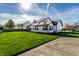 Lush backyard with a shed, basketball court, and well-maintained lawn at 1228 Knapps Ct, Greenwood, IN 46142