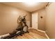 Home gym in basement with exercise machine and neutral colored walls at 1228 Knapps Ct, Greenwood, IN 46142