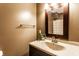 Bathroom featuring a vanity with brushed nickel faucet and decorative accents at 1228 Knapps Ct, Greenwood, IN 46142