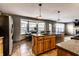 Well-designed kitchen with an island, stainless steel appliances, and a dining area with great natural light at 1228 Knapps Ct, Greenwood, IN 46142