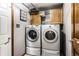Laundry room area with side-by-side washer and dryer units at 1228 Knapps Ct, Greenwood, IN 46142