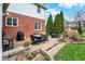 Outdoor patio area with dining furniture and landscaping, perfect for enjoying meals in the backyard at 13225 Snow Owl Dr, Carmel, IN 46033