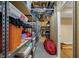 Unfinished basement featuring exposed ceiling with utility pipes and ductwork with storage shelving at 13225 Snow Owl Dr, Carmel, IN 46033