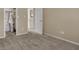 Bedroom with neutral walls featuring carpet and access to walk-in closet at 13225 Snow Owl Dr, Carmel, IN 46033