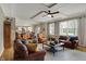 Inviting living area with hardwood floors, neutral colors, and seamless flow into the kitchen and dining areas at 13225 Snow Owl Dr, Carmel, IN 46033