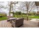 Inviting back deck featuring outdoor seating and a beautiful view of the backyard at 1550 Renee Dr, Plainfield, IN 46168