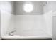 Bright and clean bathroom featuring a built in soaker tub with chrome hardware at 1550 Renee Dr, Plainfield, IN 46168