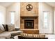 Close up view of the fireplace in the living room with Gathering name initial at 1550 Renee Dr, Plainfield, IN 46168